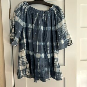 NWT elastic neck and ruffle on bottom and on bottom of 3/4” sleeves.